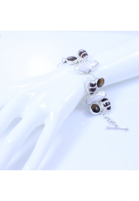 Sterling silver bracelet with mother-of-pearl, tiger eye and shells